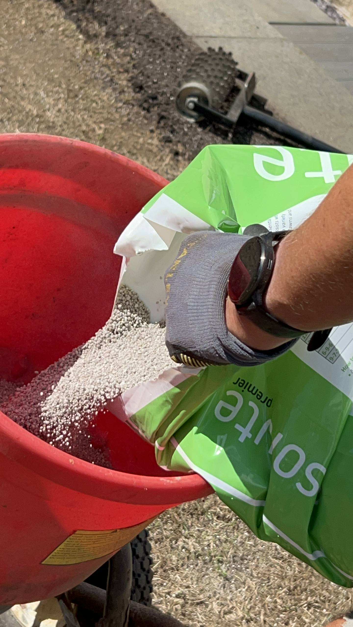 Pre Seeding Fertiliser Being Poured Into a Spreader