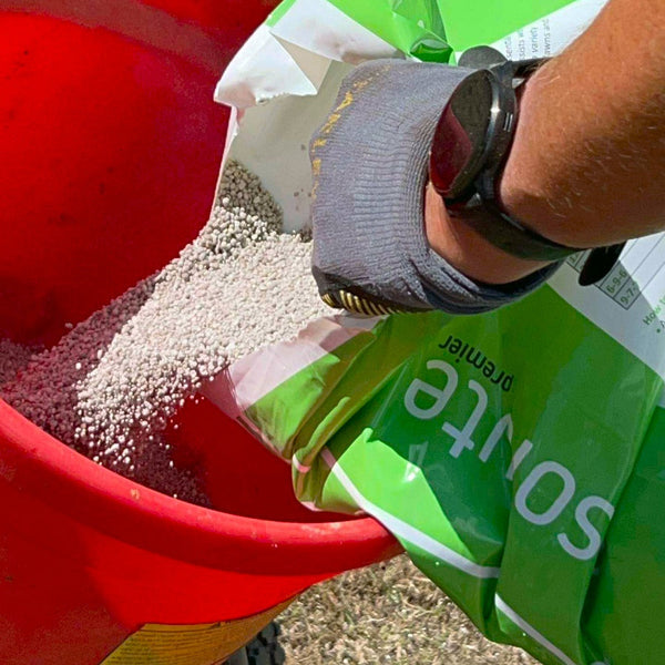 Pre Seeding Fertiliser Being Poured Into a Spreader
